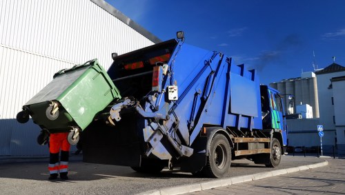 Van outside a Hounslow commercial property ready to load waste